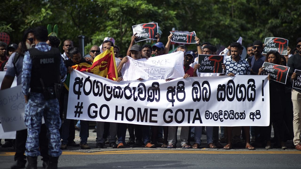 Sri Lankans living in the Maldives stage a demonstration in Male on July 13, 2022, to protest for the arrival of former President Gotabaya Rajapaksa. Credit: AFP Photo