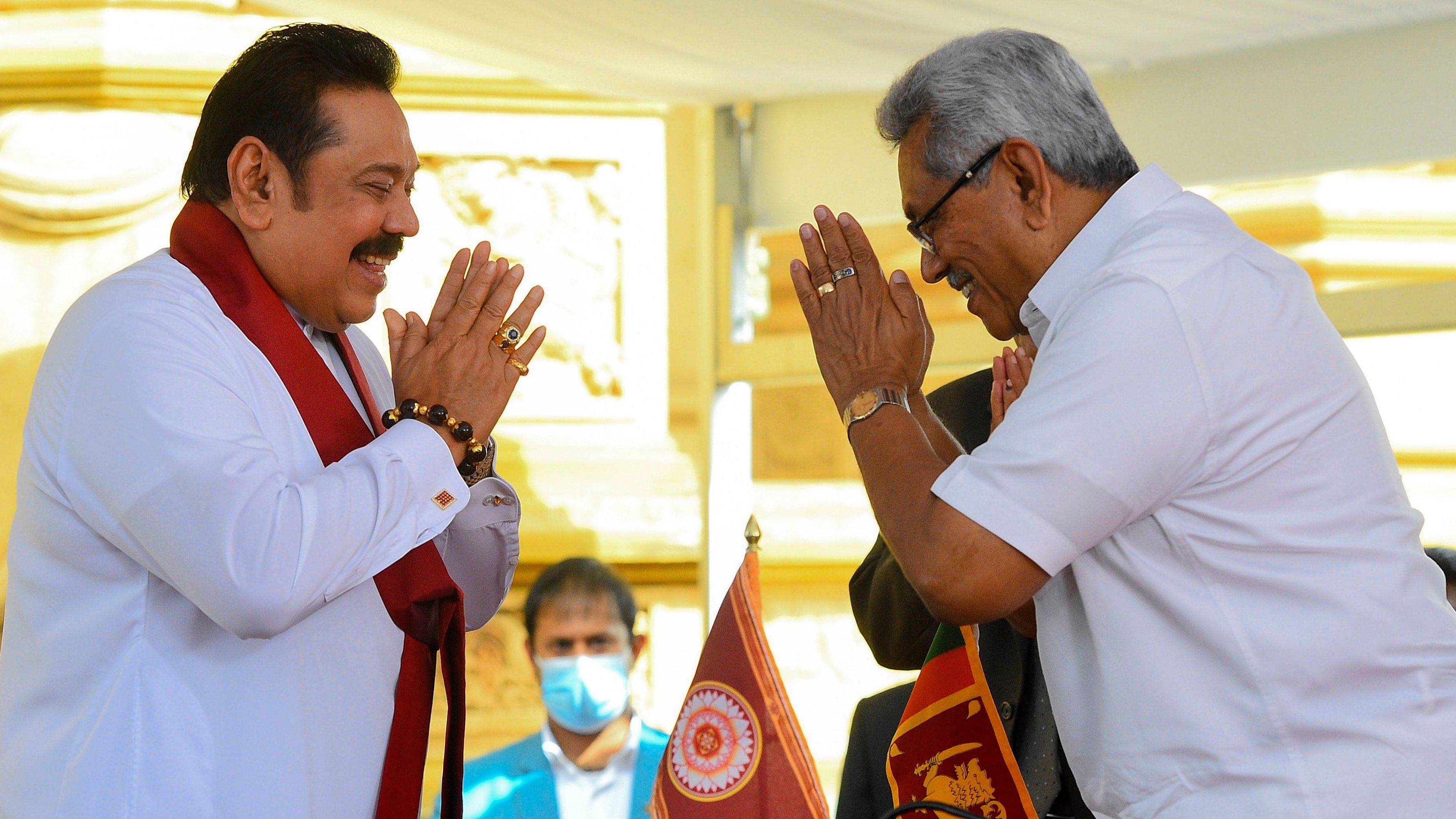 Sri Lakan President Gotabaya Rajapaksa (R) with his elder brother Mahinda Rajapaksa (L). Credit: AFP Photo