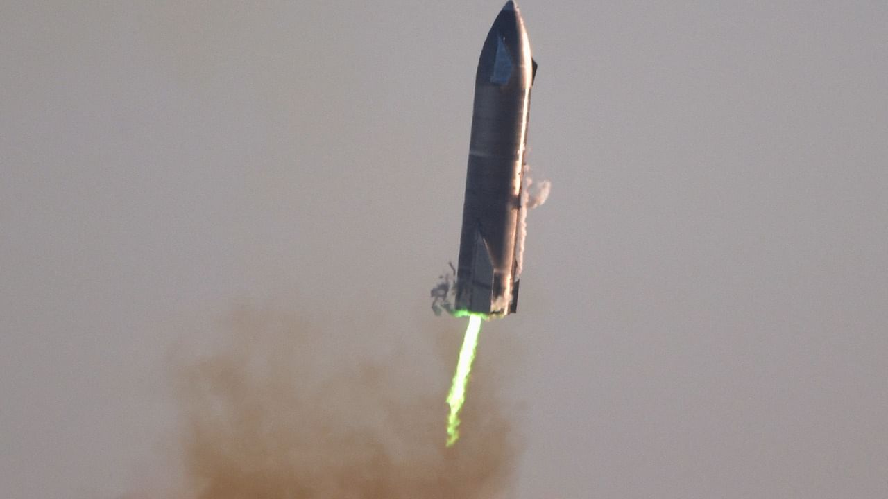 SpaceX's first super heavy-lift Starship SN8 rocket prepares to land after it launched from their facility on a test flight in Boca Chica, Texas. Credit: Reuters Photo