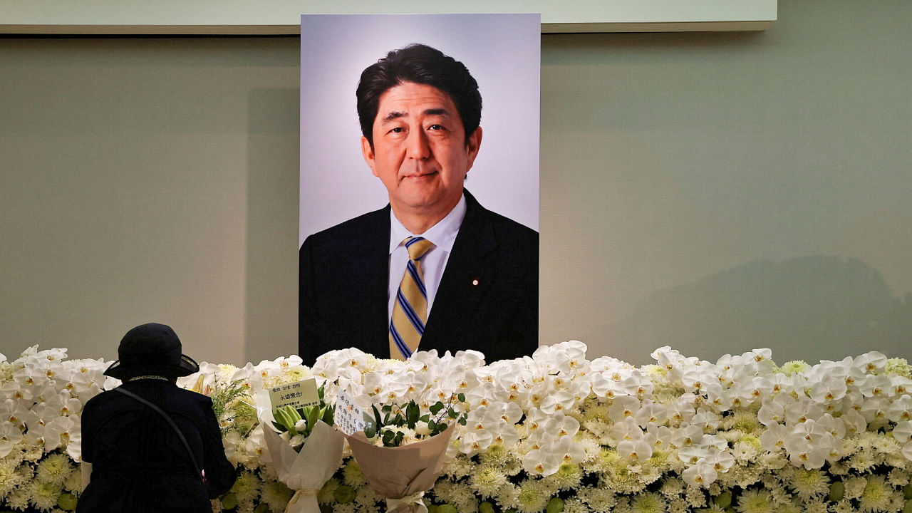 A mourner pays tribute to late former Japanese PM Shinzo Abe. Credit: Reuters File Photo