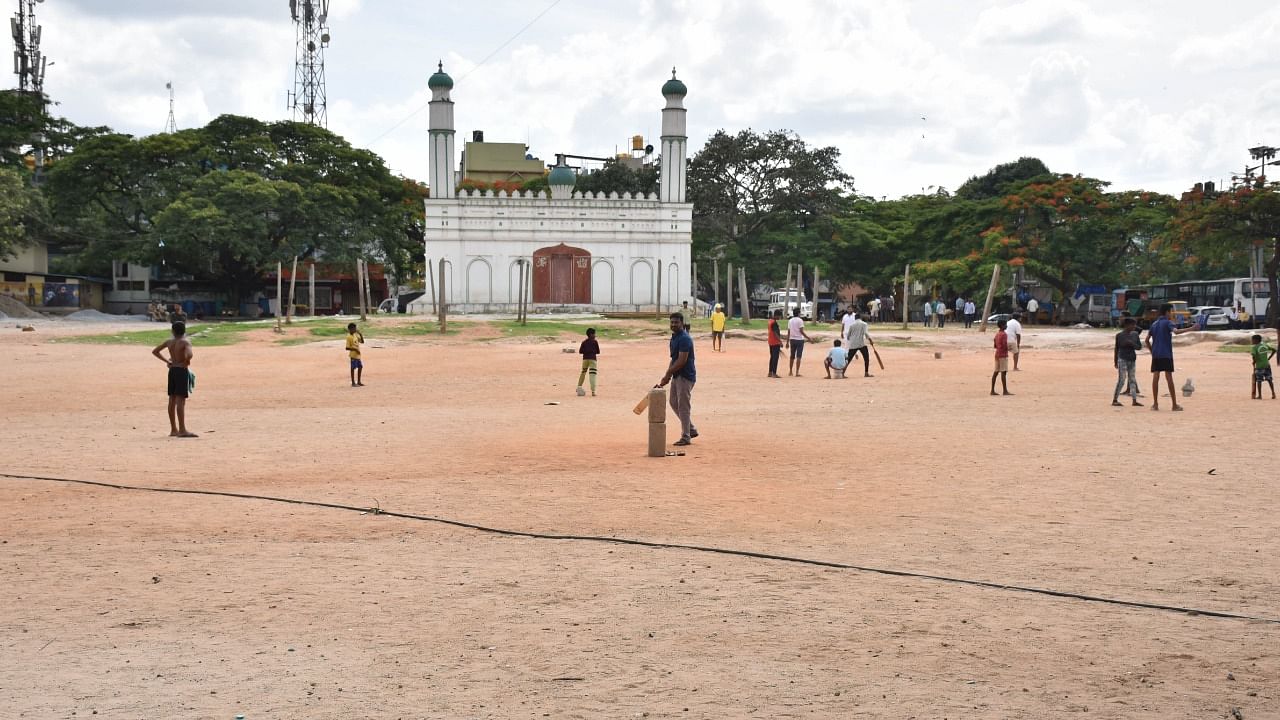 Children play at the Chamarajpet ground. Credit: DH Photo
