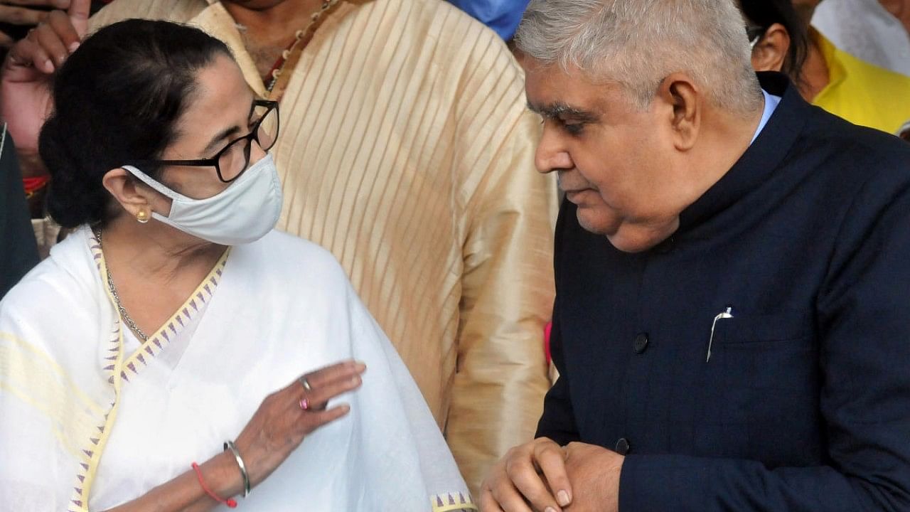 West Bengal Governor Jagdeep Dhankhar with state CM Mamata Banerjee. Credit: PTI File Photo