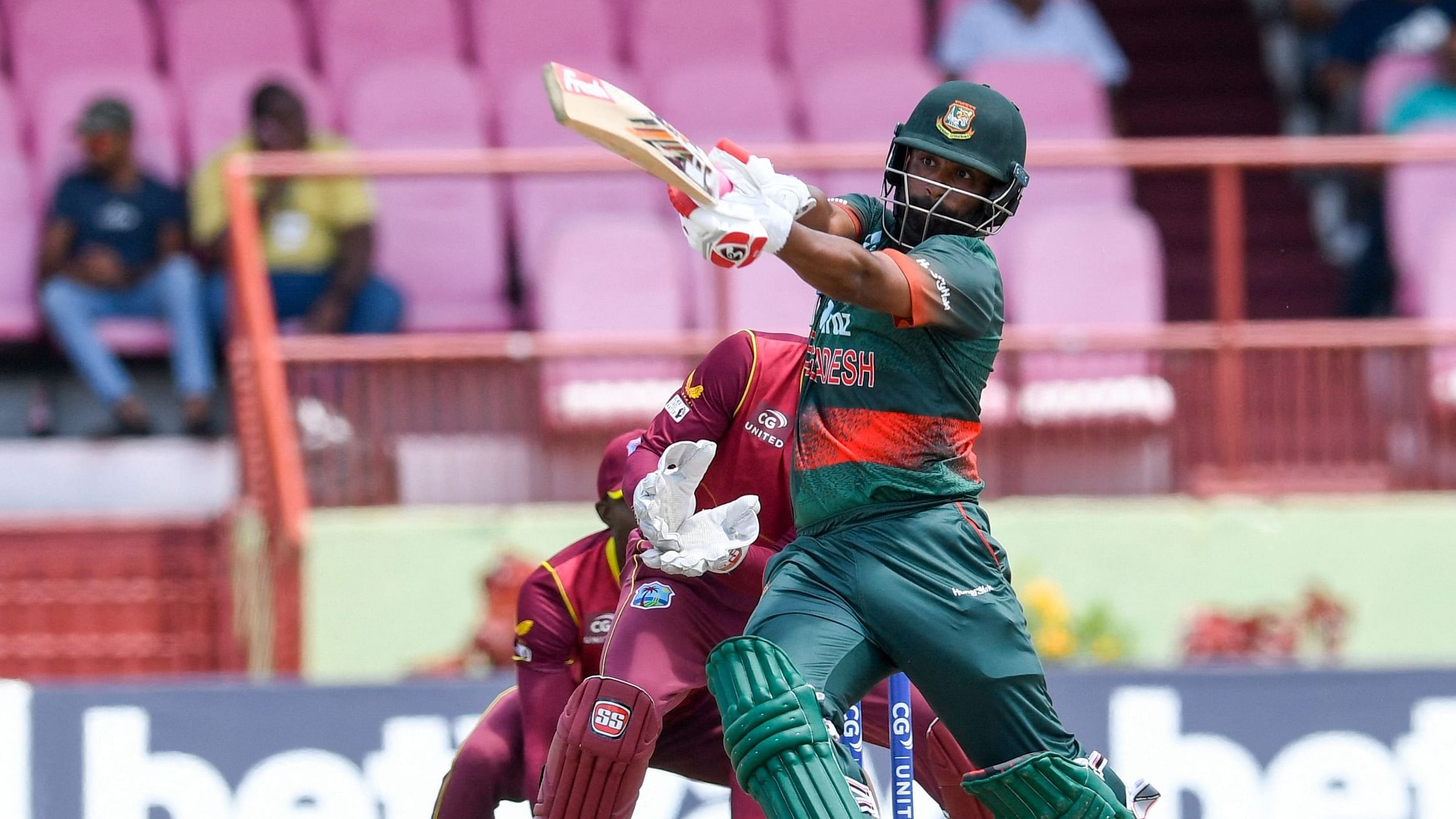 Tamim Iqbal of Bangladesh hits 4 during the 2nd ODI match between West Indies and Bangladesh at Guyana National Stadium in Providence, Guyana. Credit: AFP File Photo