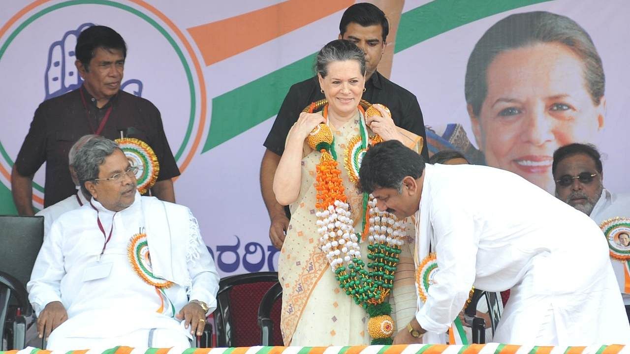 While Congress has been a family fiefdom for decades, inner-party democracy is diminishing in the BJP also. In the pic, Sonia Gandhi is seen with Siddaramaiah and D K Shivakumar. Credit: PTI Photo