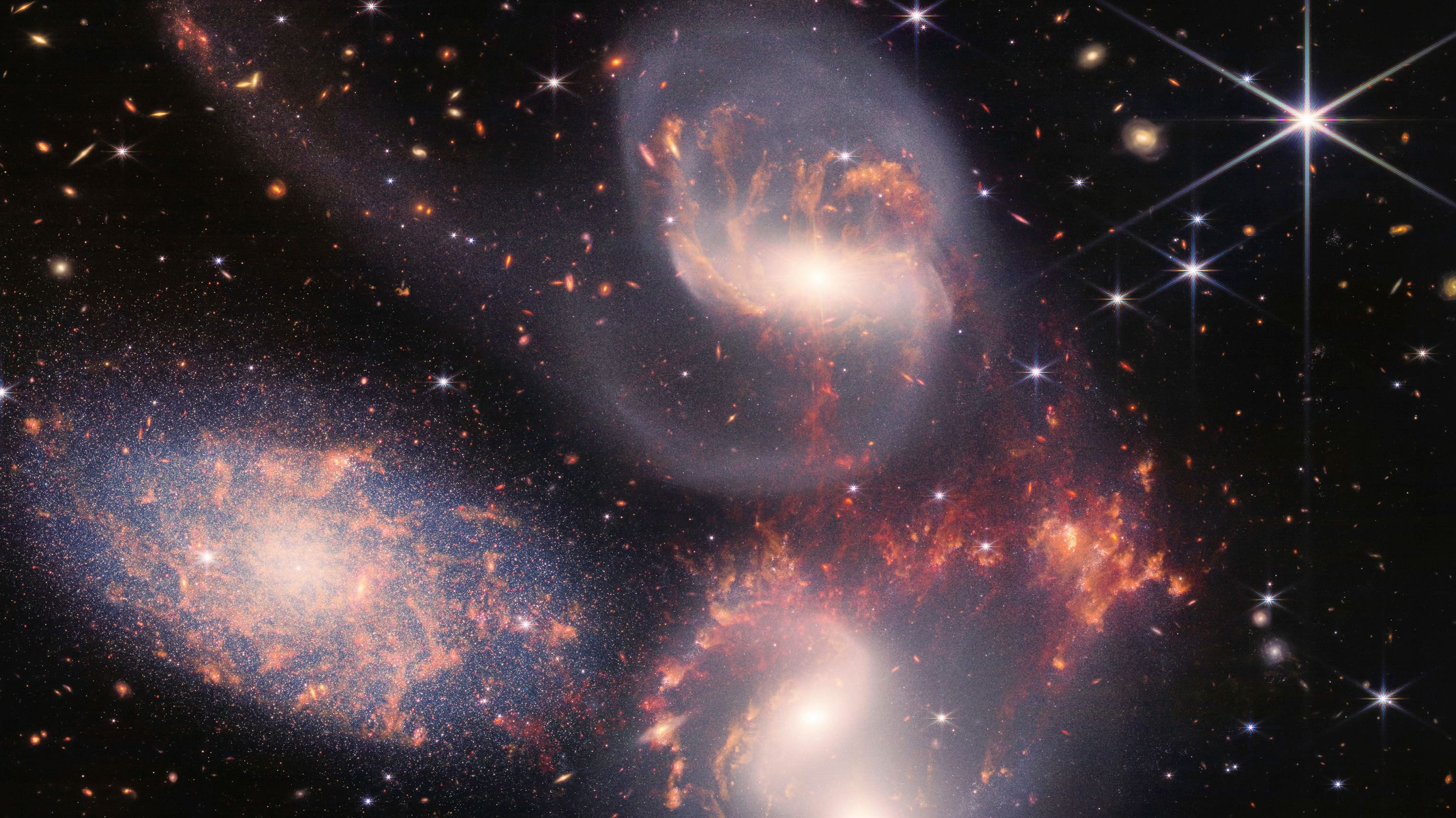 This image provided by NASA on Tuesday, July 12, 2022, shows Stephan's Quintet, a visual grouping of five galaxies captured by the Webb Telescope's Near-Infrared Camera (NIRCam) and Mid-Infrared Instrument (MIRI). This mosaic was constructed from almost 1,000 separate image files, according to NASA. Credit: AP/PTI File Photo