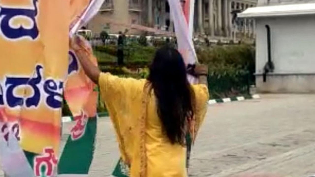 Meanwhile, a video has gone viral showing a woman tearing up Ravi's birthday hoarding put up on the footpath outside the Vidhana Soudha.  Credit: DH Photo
