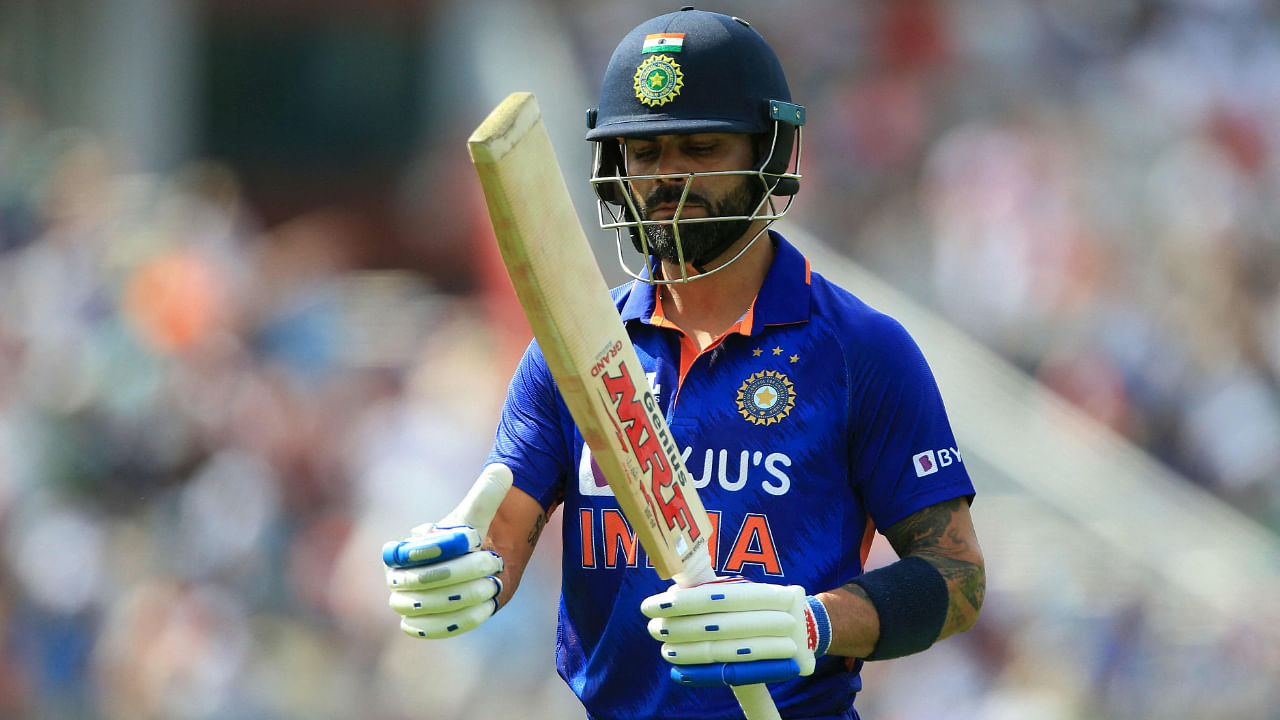 Virat Kohli walks back to the pavilion after losing his wicket for 17 runs during the final ODI match against England, July 17, 2022. Credit: AFP Photo