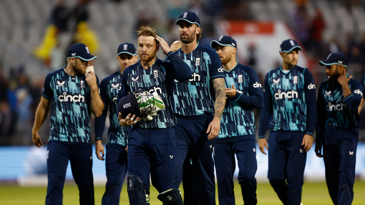 England's Jos Buttler with teammates celebrate after their win over South Africa, July 22, 2022. Credit: Reuters Photo