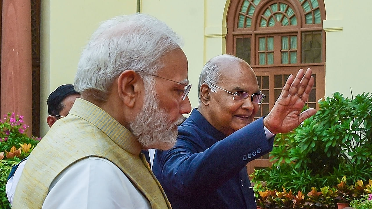 Outgoing President Ram Nath Kovind with Prime Minister Narendra Modi arrives in a ceremonial procession for his farewell function at Parliament House Complex in New Delhi, Saturday, July 23, 2022. Credit: PTI Photo
