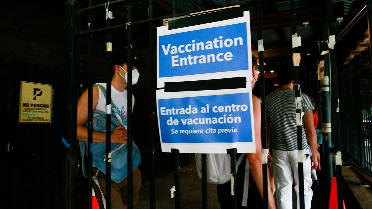 People wait in line to recieve the Monkeypox vaccine before the opening of a new mass vaccination site. Credit: AFP Photo