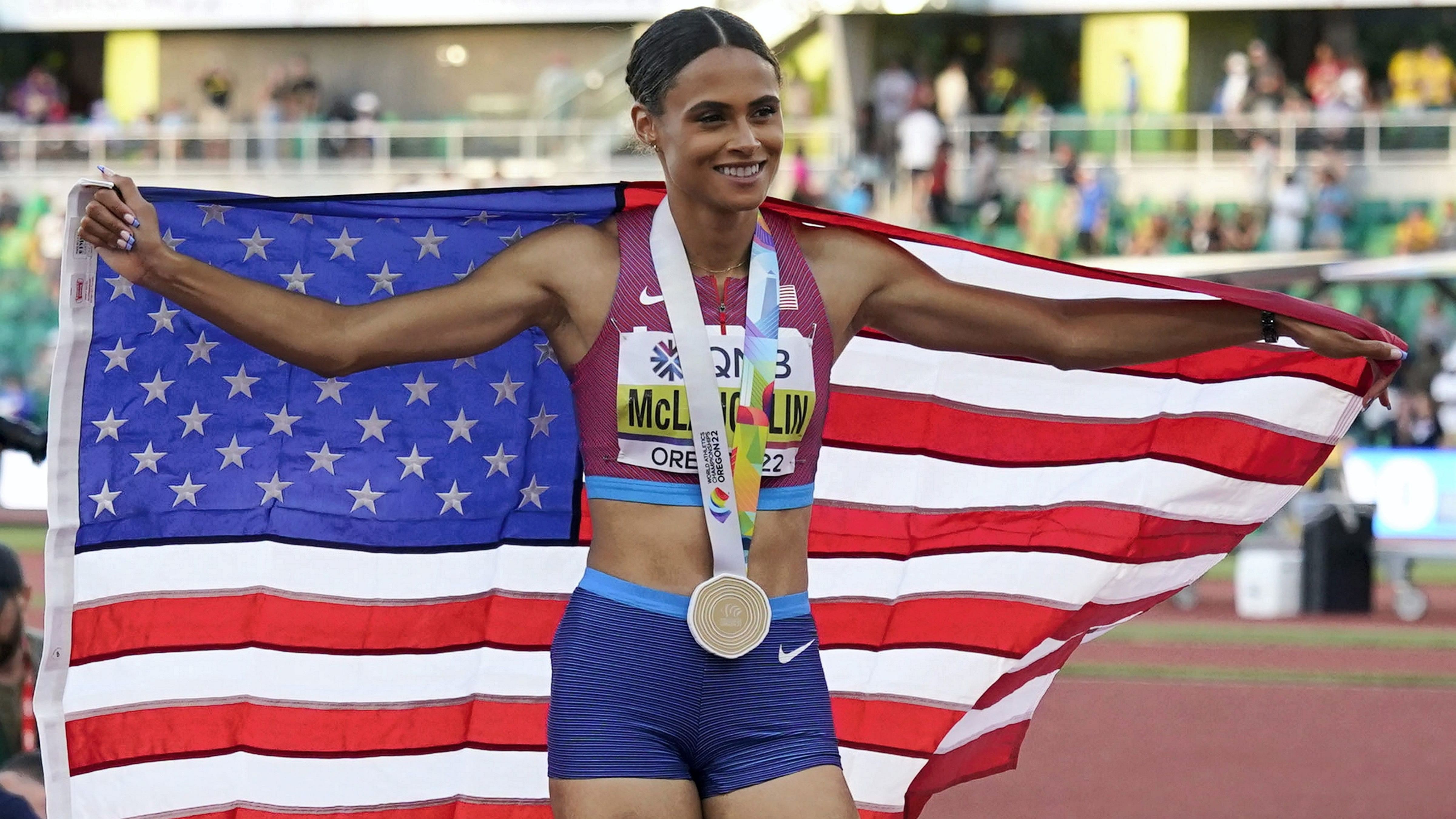 The US track star obliterated her world record at Hayward Field in Eugene to power home in 50.68sec, slicing more than half a second of her previous world mark. Credit: AFP photo