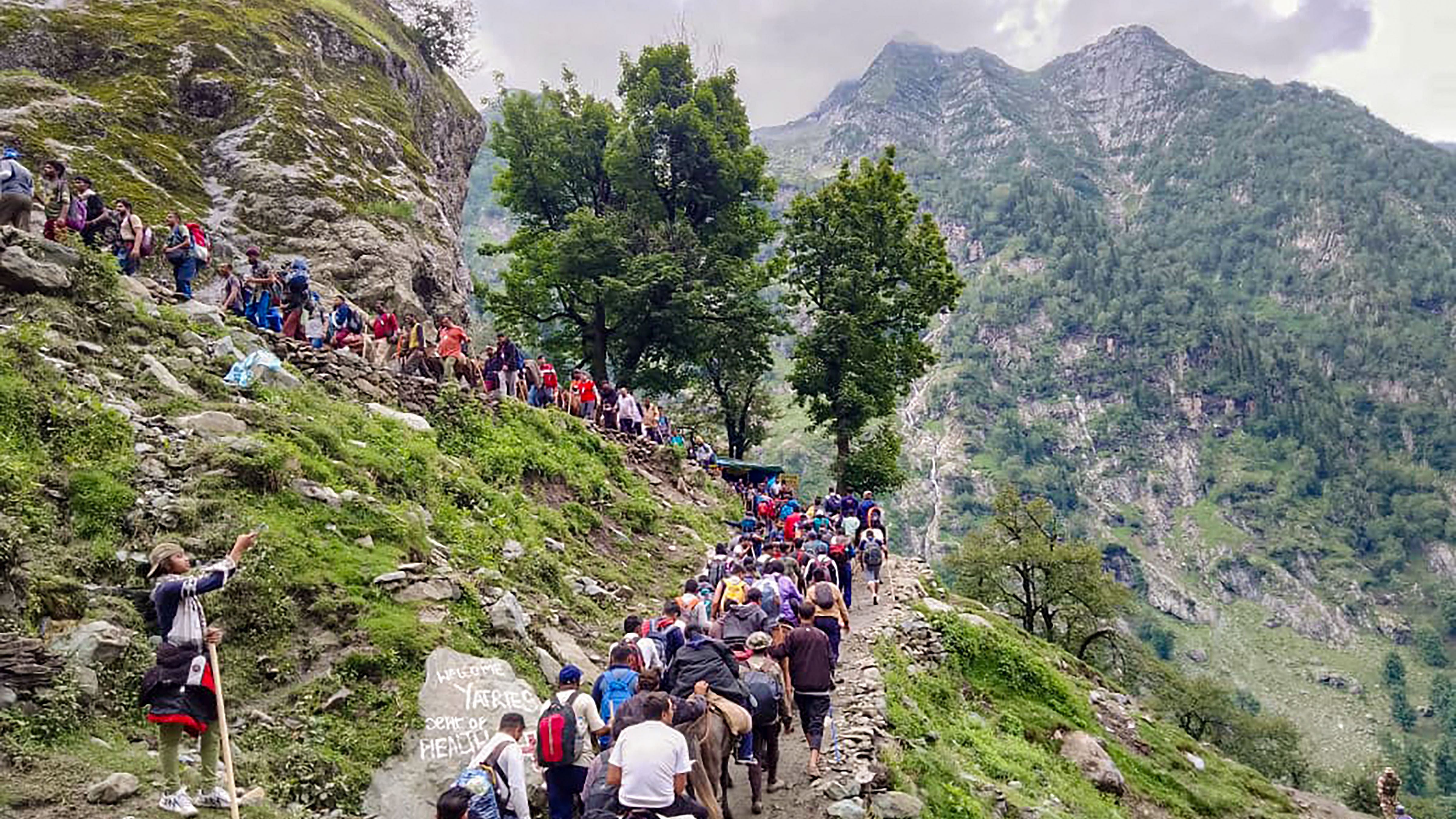 On Sunday morning, the new batch of 7,009 pilgrims left the Bhagwati Nagar base camp in Jammu in two escorted convoys. Credit: PTI photo 