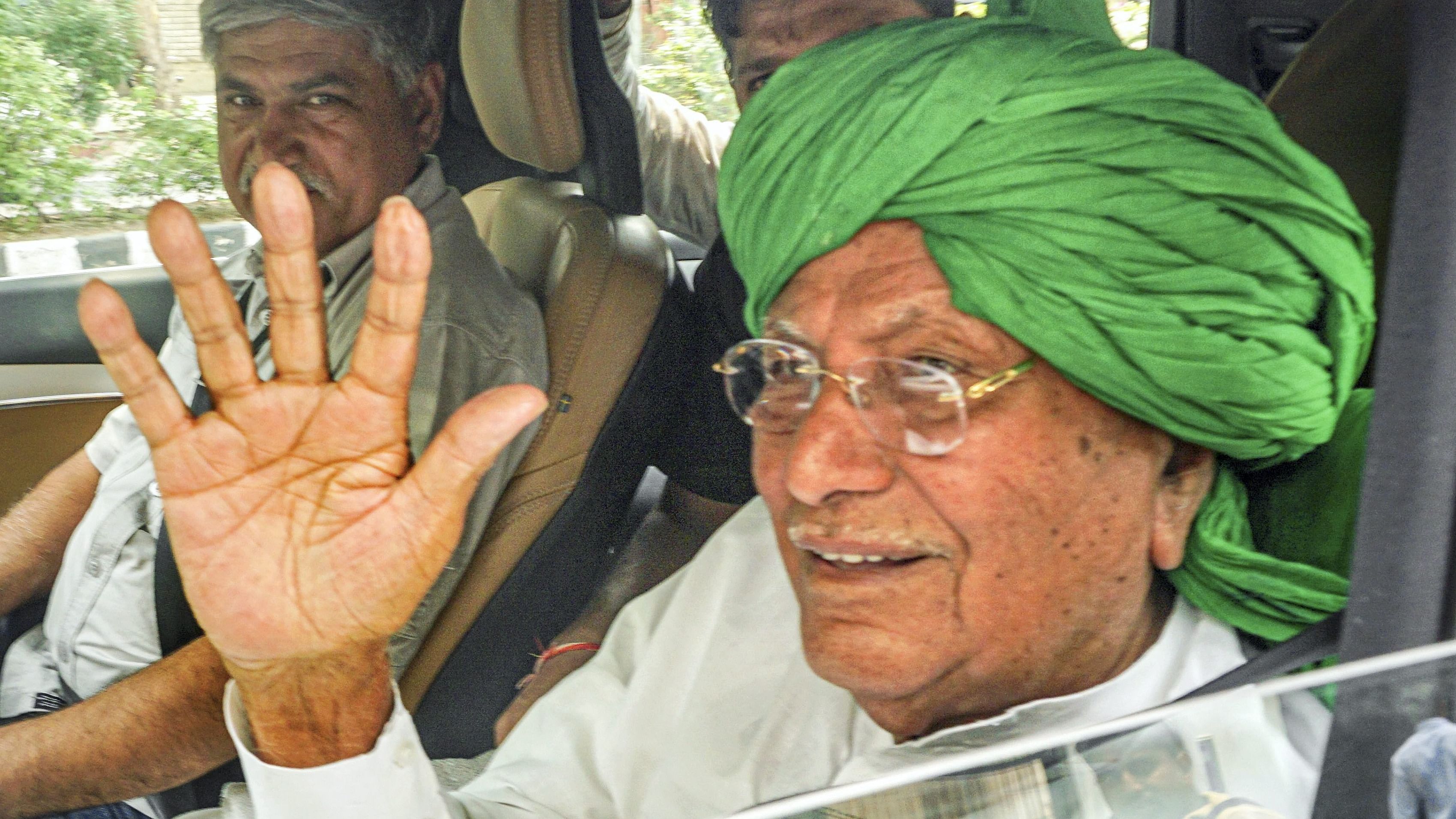 Former Haryana Chief Minister Om Prakash Chautala leaves after a hearing in the disproportionate assets (DA) case, in New Delhi, May 26, 2022. Credit: PTI Photo