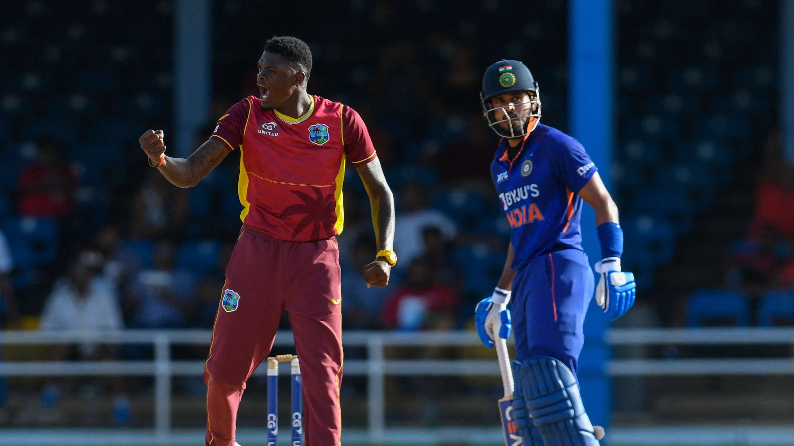 Alzarri Joseph (R) of West Indies celebrates the dismissal of Shreyas Iyer (R) of India during the 2nd ODI match between West Indies and India at Queens Park Oval, Port of Spain, Trinidad and Tobago, on July 24, 2022. Credit: AFP Photo