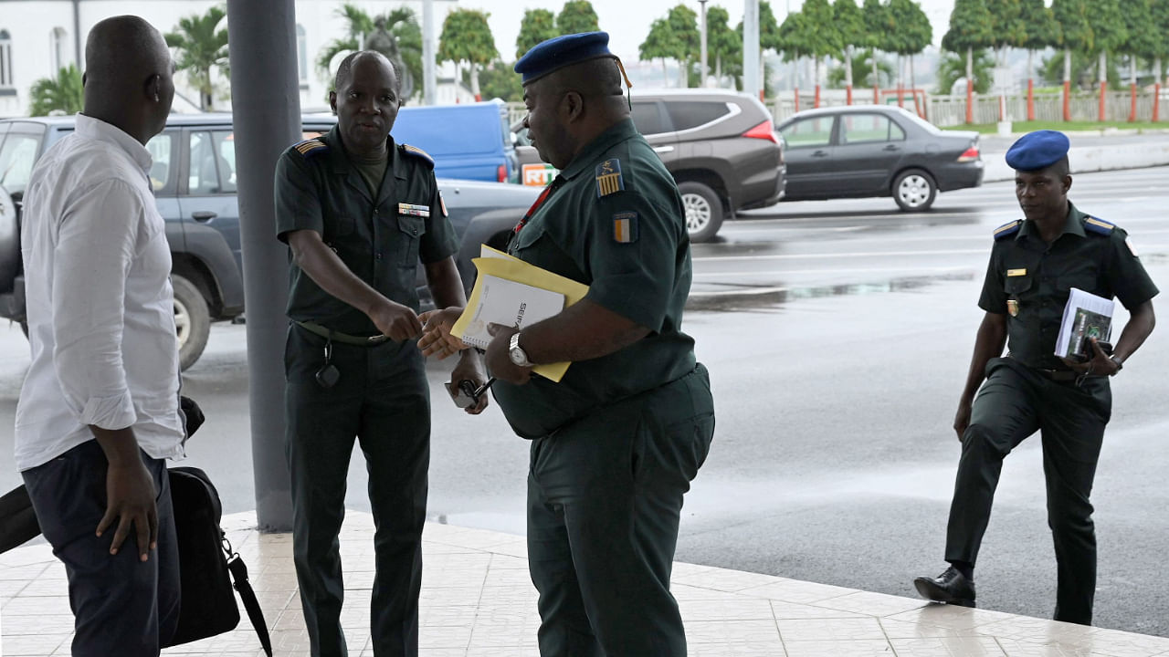 Ivorian army officers arrive for a press statement at the army HQ in Abidjan on July, 13, 2022, a day after the detention of Ivorian soldiers. Credit: AFP File Photo