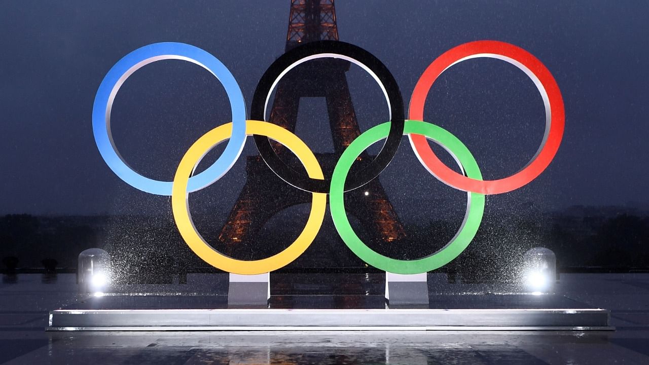 A file photo taken on September 13, 2017 shows the Olympics Rings on the Trocadero Esplanade near the Eiffel Tower in Paris. Credit: AFP Photo