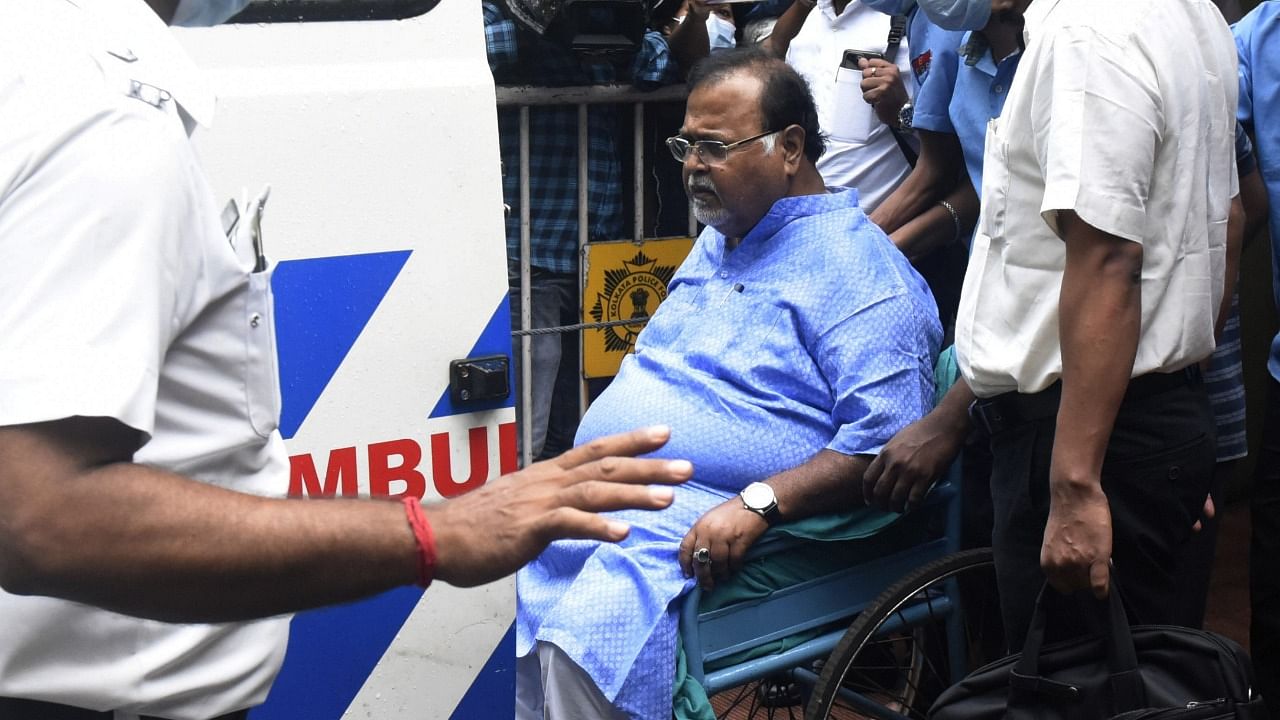 West Bengal Minister Partha Chatterjee (in wheelchair) being shifted to AIIMS Bhubaneswar. Credit: PTI Photo