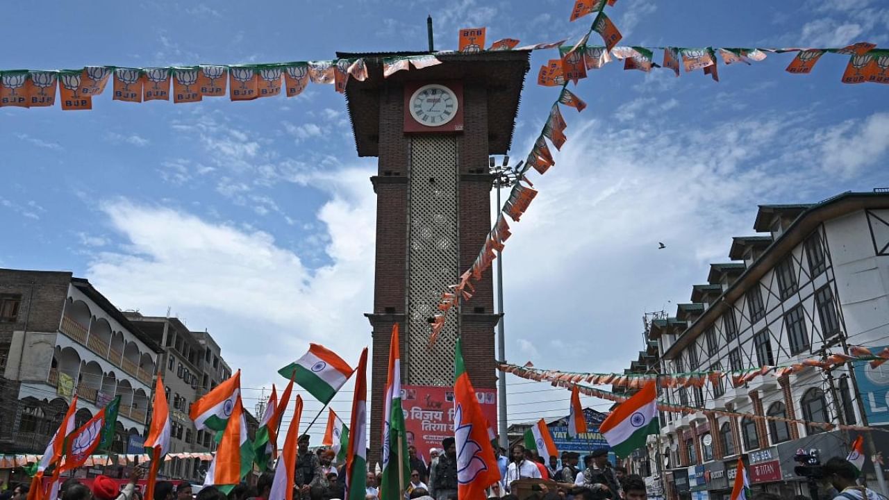 Supporters of India's Bharatiya Janata Party (BJP) attend the Tiranga bikers rally at the clock tower in Lal Chowk area of Srinagar on July 25, 2022. Credit: AFP Photo