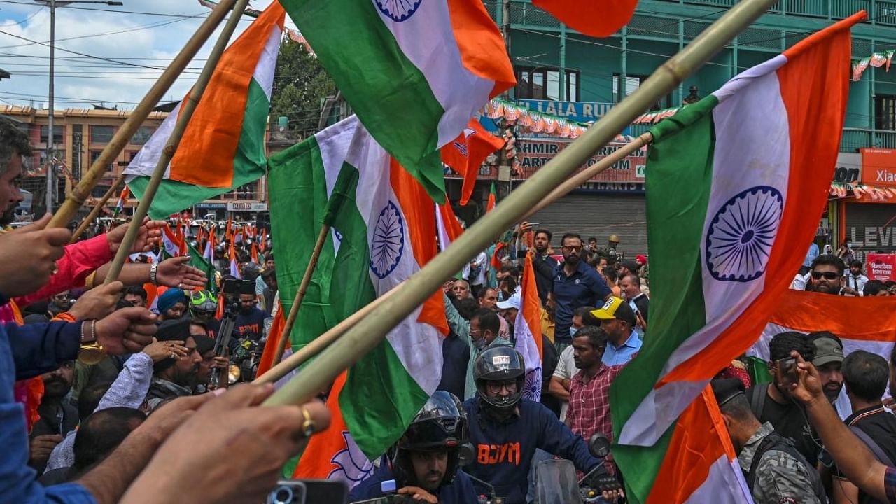 Supporters of India's Bharatiya Janata Party (BJP) attend the Tiranga bikers rally at the clock tower in Lal Chowk area of Srinagar on July 25, 2022. Credit: AFP Photo