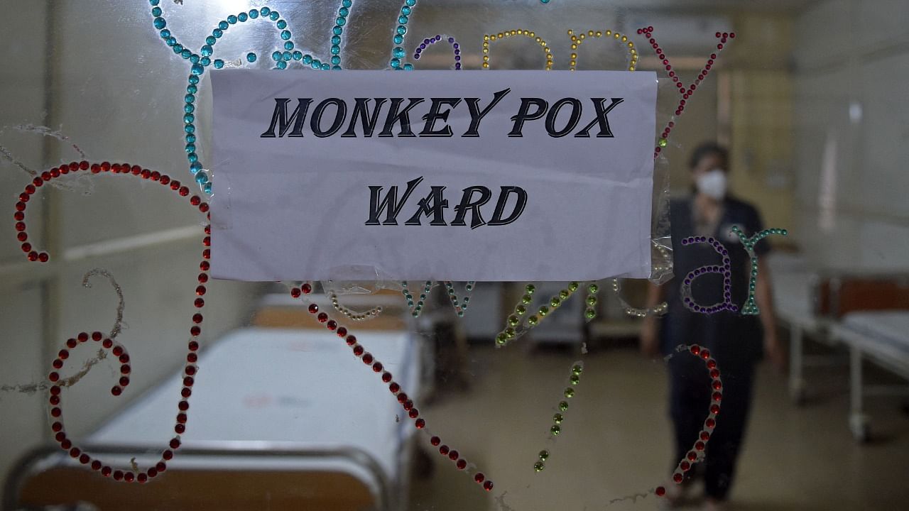 A health worker walks inside an isolation ward built as a precautionary measure for the monkeypox patients at a civil hospital in Ahmedabad. Credit: AFP Photo