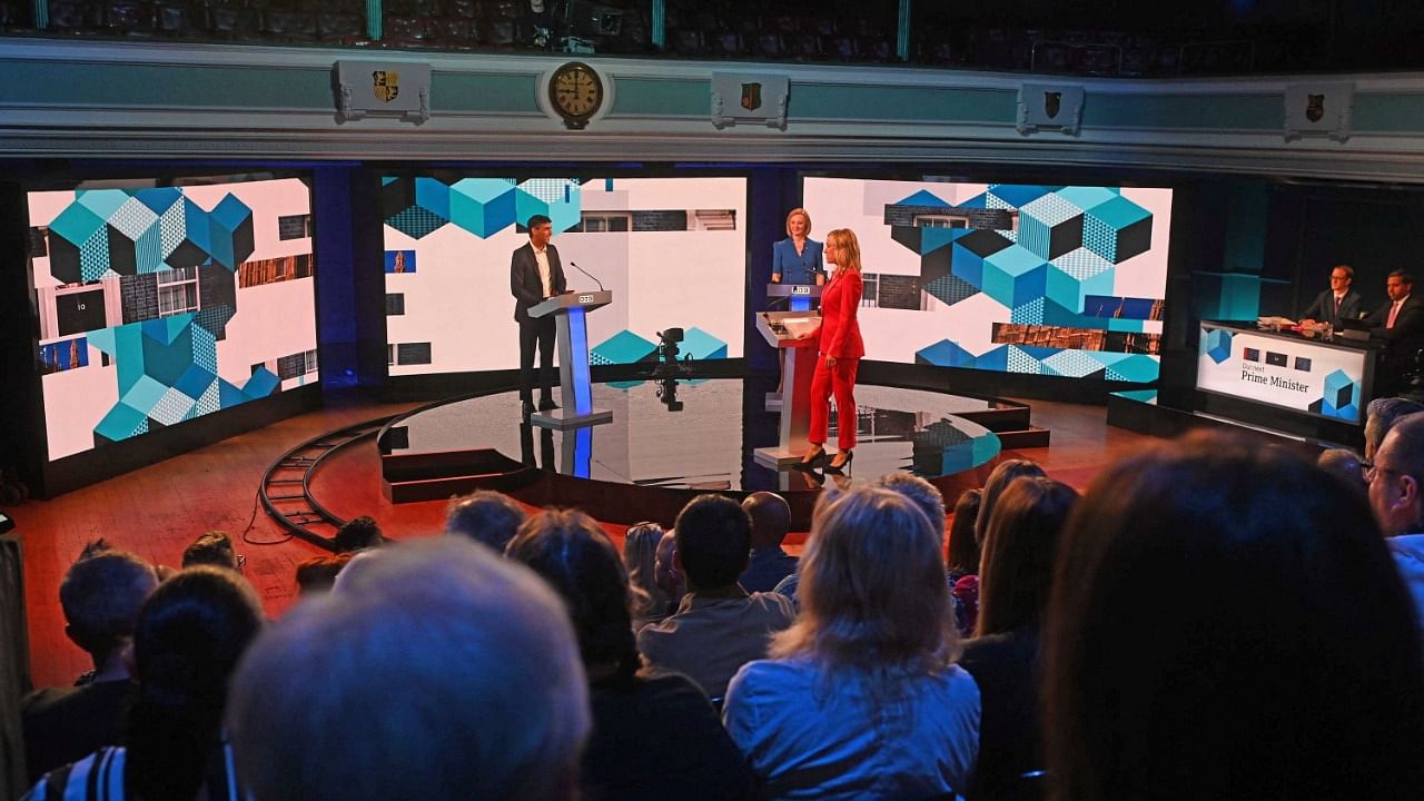 Candidates Rishi Sunak and Liz Truss take part in the BBC Conservative party leadership debate at Victoria Hall in Hanley, Stoke-on-Trent, Britain. Credit: Reuters photo/Jeff Overs/BBC/Handout