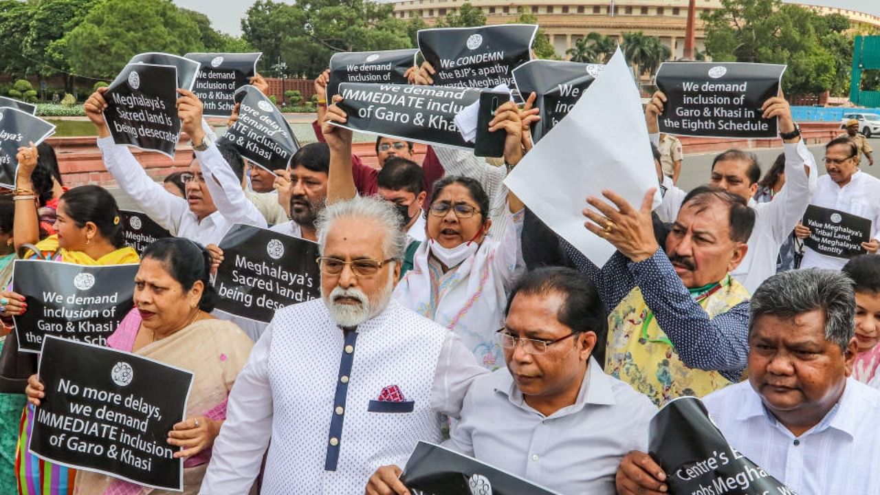 TMC MPs during a protest march to raise issues concerning the Meghalaya State, near Parliament House, in New Delhi, Tuesday, July 26, 2022. Credit: PTI Photo