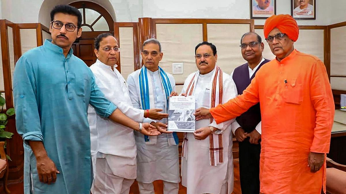 Members of BJP's fact-finding committee hand over their official report regarding the case of self-immolation by Sadhu Vijay Das and alleged illegal mining in Rajasthan, to BJP National President J P Nadda. Credit: PTI Photo