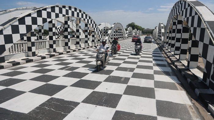 The iconic Napier Bridge next to the Marina Beach in Chennai wearing a chequered look as the city prepares itself to host the 44th Chess Olympiad. Credit: DH Photo