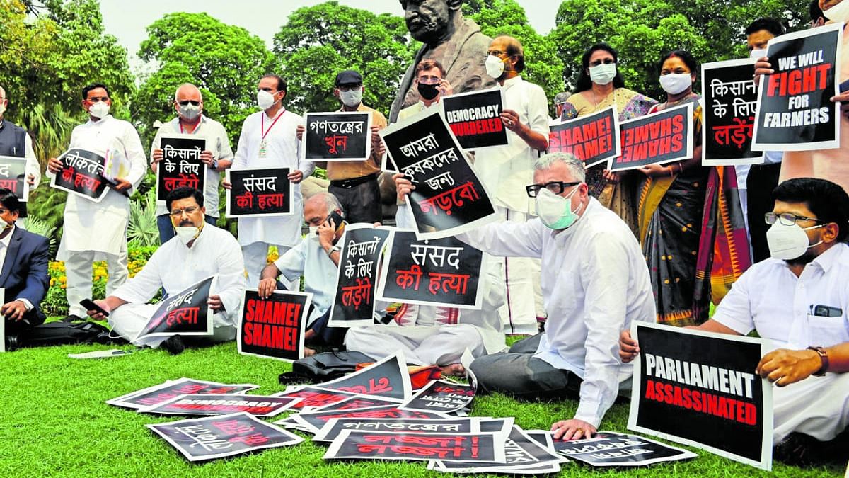 Derek O'Brien of TMC and other opposition parties members stage a protest over suspension of eight Rajya Sabha members, farmers' problems and other issues, during ongoing Monsoon Session of Parliament, in New Delhi. Credit: PTI Photo