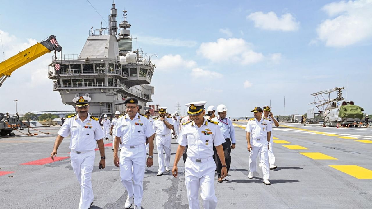 Indian Navy personnel while taking delivery of the prestigious Indigenous Aircraft Carrier (IAC) ‘Vikrant' from her builder Cochin Shipyard Limited (CSL), Kochi. Credit: PTI Photo