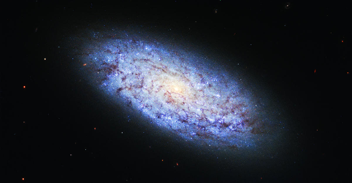 The team looked at 11 blue dwarf galaxies that are 1.3-2.8 billion light years away. Credit: Nasa's Hubble Telescope