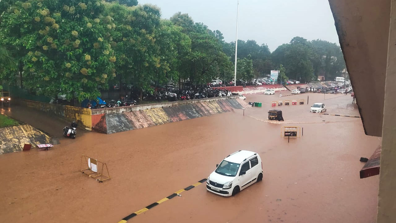 The flooded Mangaluru Central Railway station parking area. Credit: DH Photo