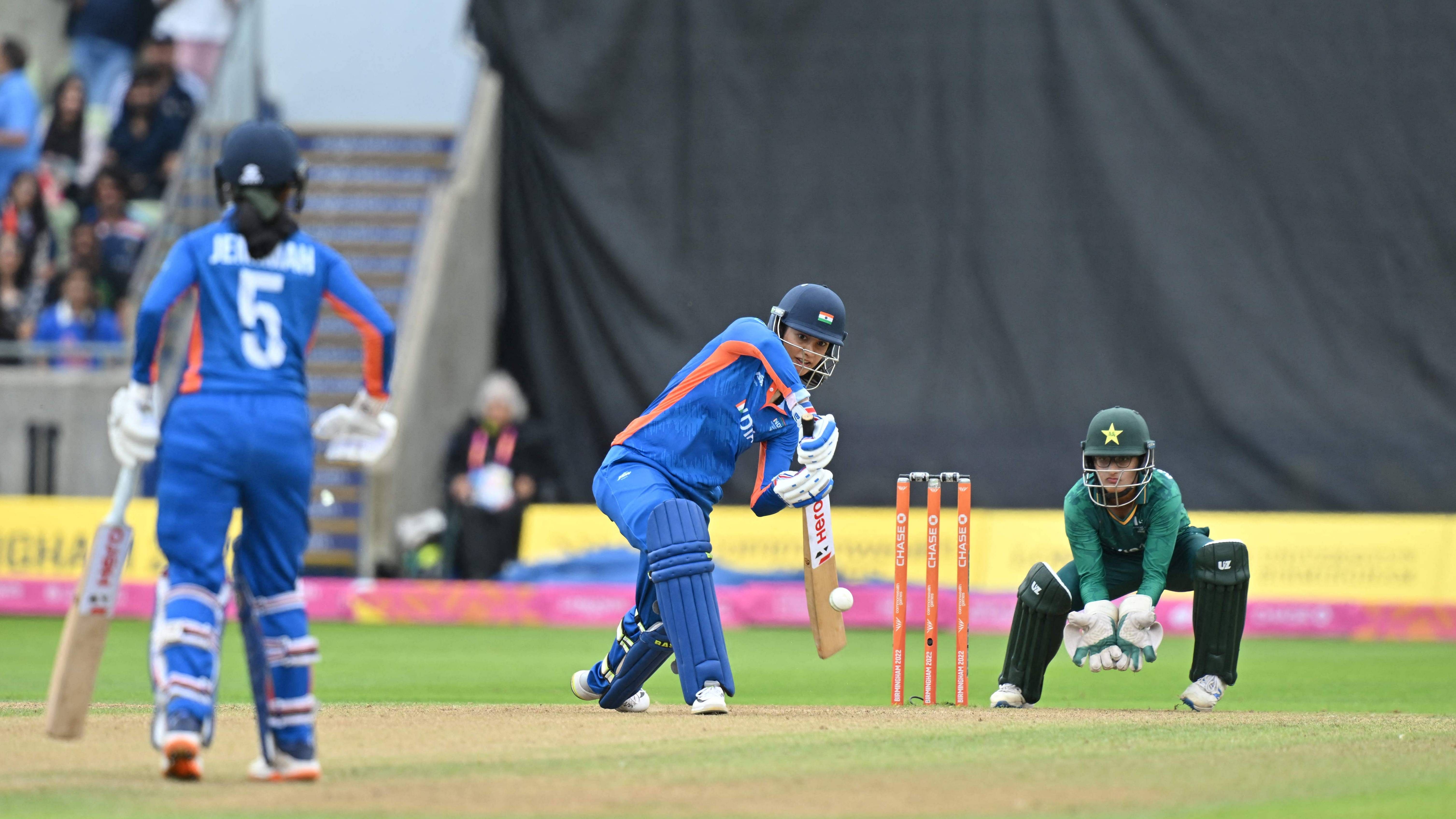 India's Mandhana (L) bats during the T20 cricket match at the CWG. Credit: AFP Photo