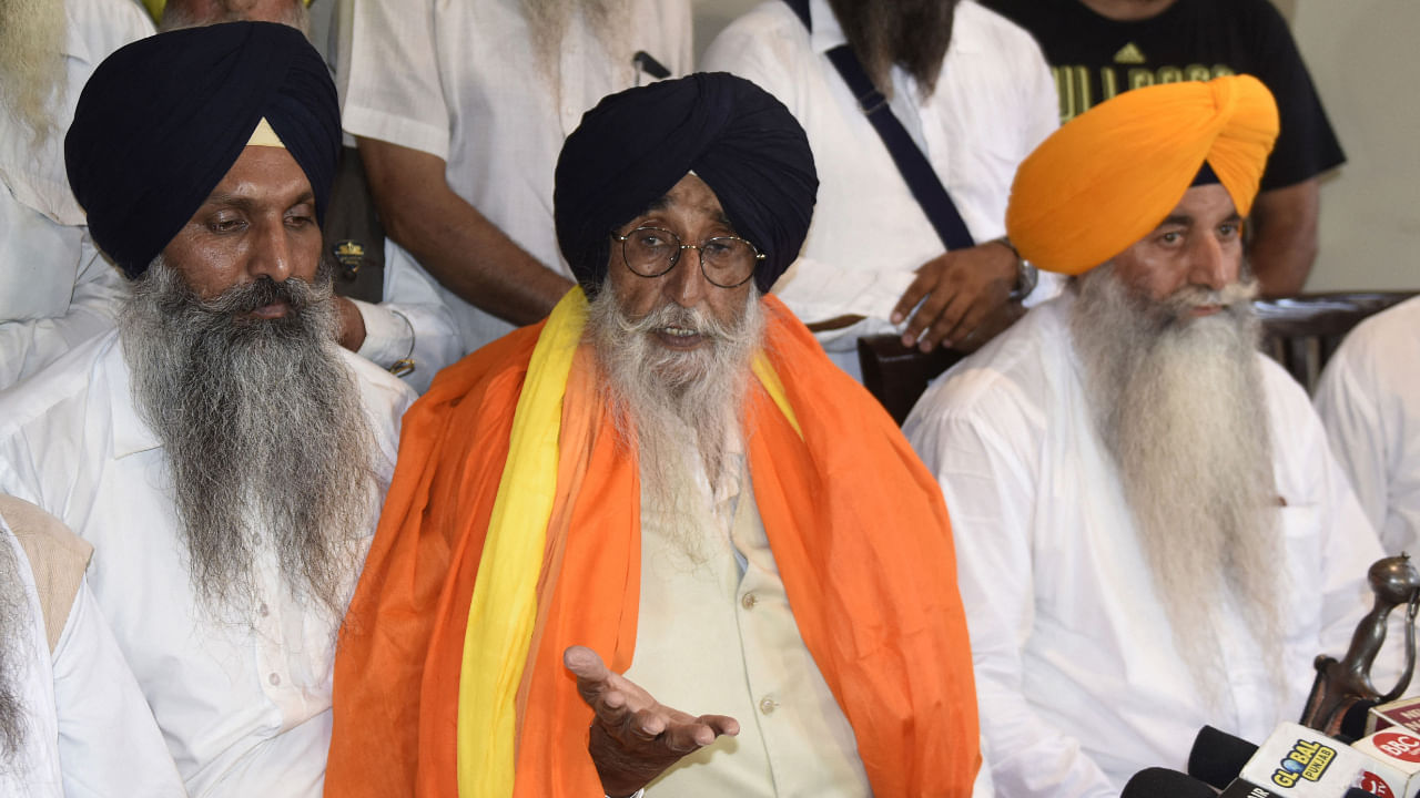 Simranjtit Singh Mann (centre) addresses a press conference in Amritsar, July 5, 2022. Credit: AFP File Photo