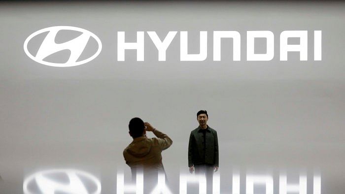Hyundai, its independent Genesis brand, and Kia sold 128,283 vehicles in the world's most important automobile market in July. Credit: Reuters File Photo