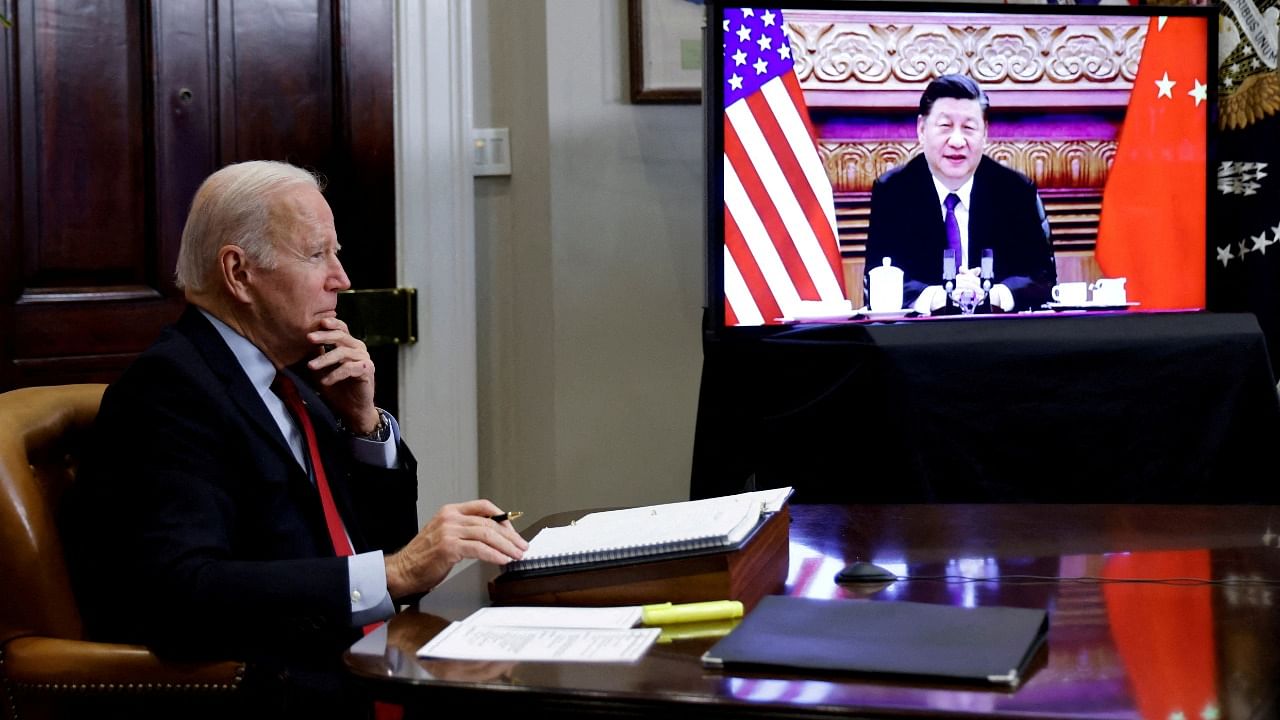 US President Joe Biden speaks virtually with Chinese leader Xi Jinping from the White House in Washington. Credit: Reuters Photo