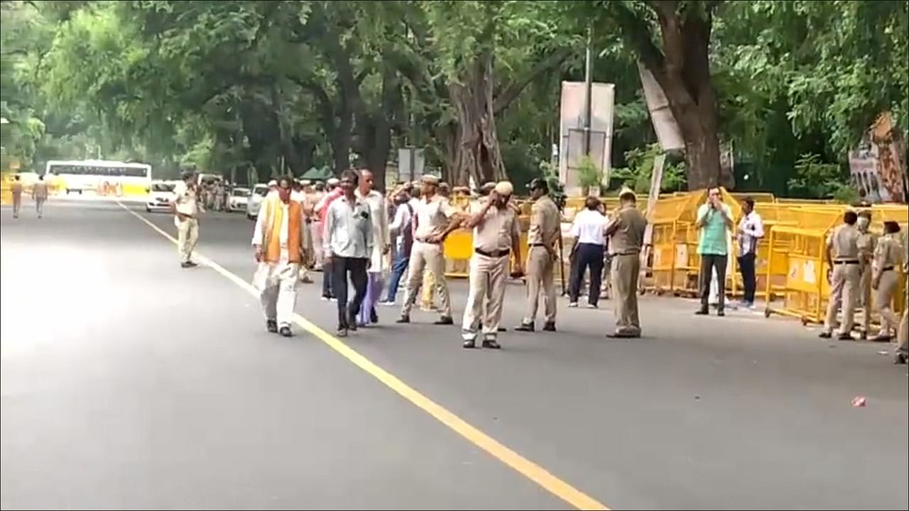 Congress general secretary Jairam Ramesh shared a video showing heavy police presence outside the AICC headquarters here and the road sealed for traffic. Credit: Twitter/@Jairam_Ramesh