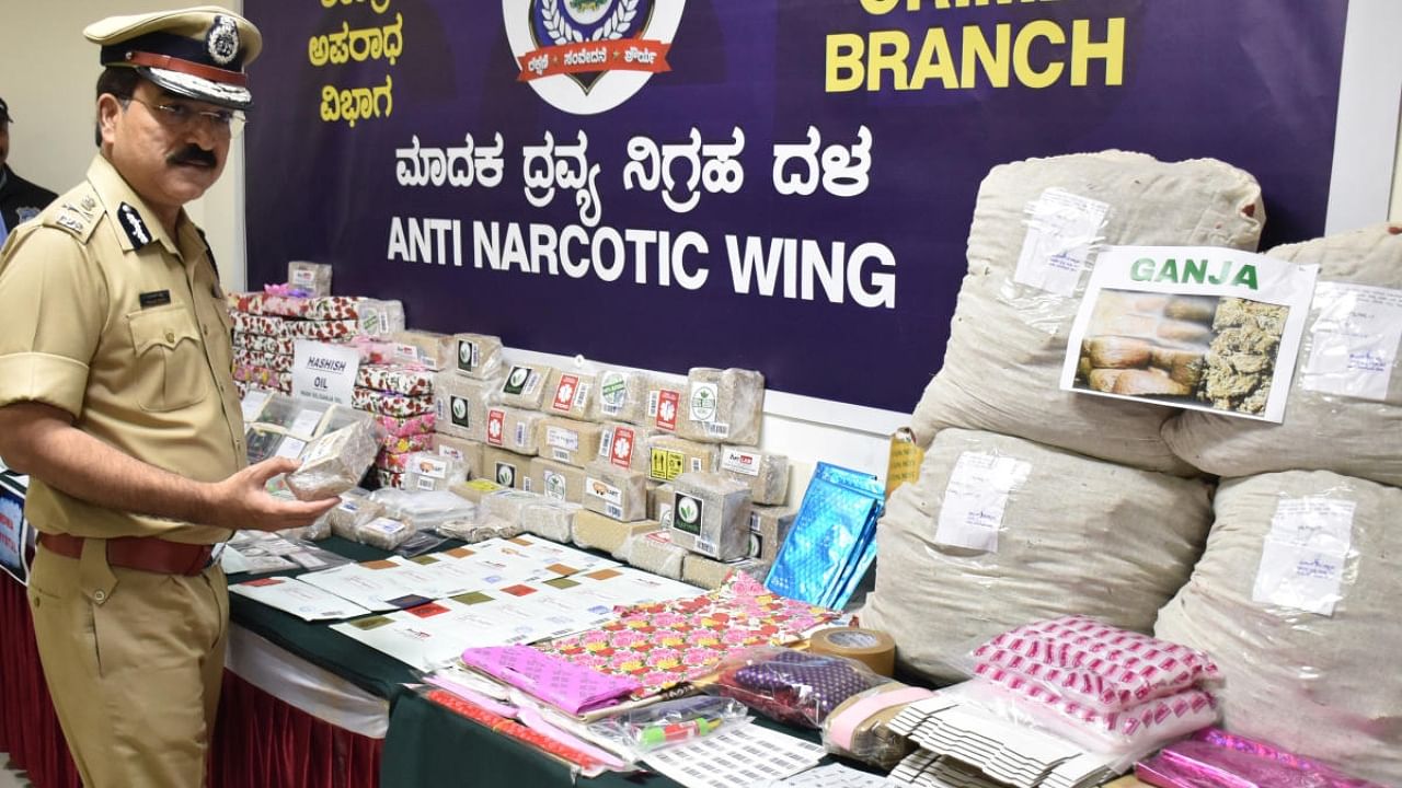Police Commissioner CH Pratap Reddy with the seized drugs in Bengaluru on Tuesday. DH Photo/B K Janardhan
