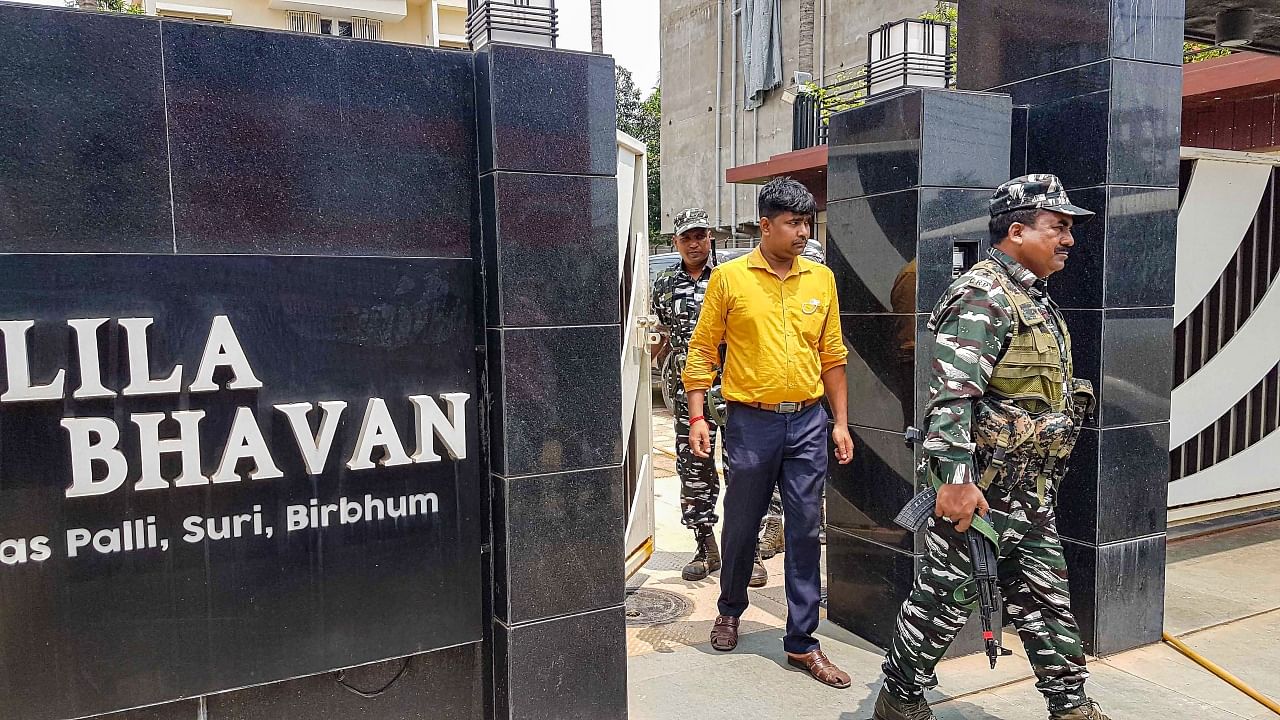 Officials of Central Bureau of Investigation (CBI) leave after conducting a raid at the residence of stone merchant Tulu Mondal, a close aide of Trinamool Congress (TMC) Birbhum chief Anubrata Mondal, in connection with their investigation into an alleged cattle smuggling scam, in Birbhum. Credit: PTI Photo