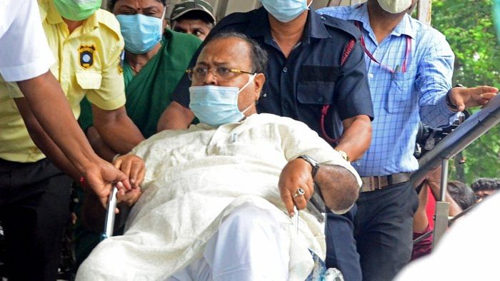 TMC leader Partha Chatterjee being brought to Joka ESI hospital for medical examination, in Kolkata on Sunday, July 31, 2022. Credit: IANS File Photo