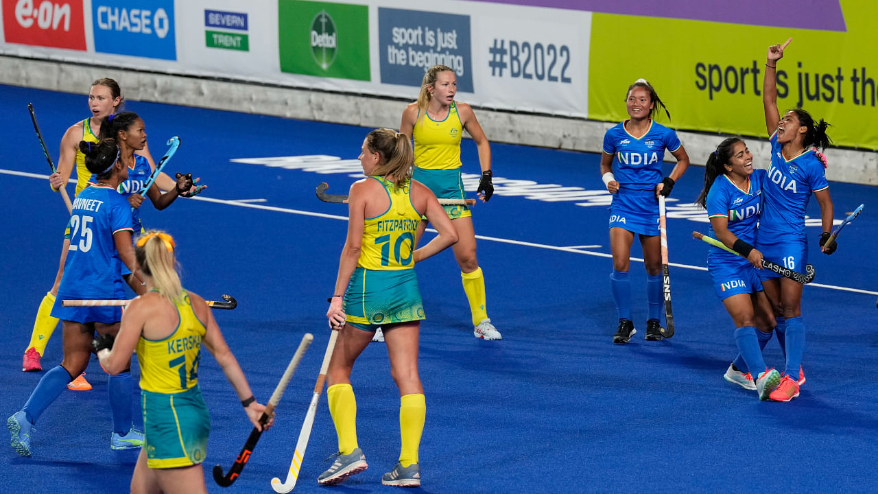 India's Vandana Katariya, right, celebrates after scoring her side's first goal during the women's semifinal hockey match between Australia and India at the Commonwealth Games in Birmingham, England, Friday, Aug. 5, 2022. Credit: AP/PTI Photo