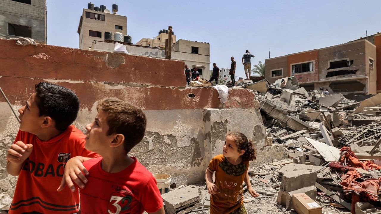 Children react following an Israeli air strike in Gaza City on August 6, 2022. Credit: AFP Photo