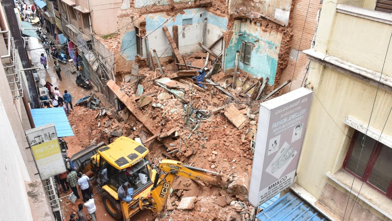 An old dilapidated building in Mamulpet, near Avenue Road, collapsed due to persistent rain on Saturday morning. Credit: DH Photo/ B K Janardhan