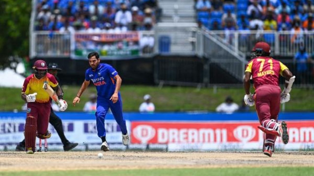 Bhuvneshwar Kumar, of India (C), runs to catch the ball during the fourth T20I match between West Indies and India at the Central Broward Regional Park in Lauderhill, Florida, on August 6, 2022. Credit: AFP Photo