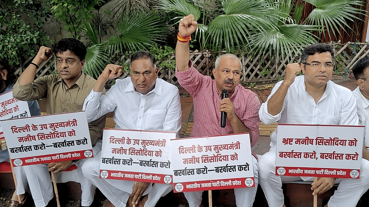  BJP MP Parvesh Verma, Delhi BJP president Aadesh Gupta with party MLAs protest demanding Dy CM Manish Sisodia resignation over liquor scam. Credit: IANS Photo