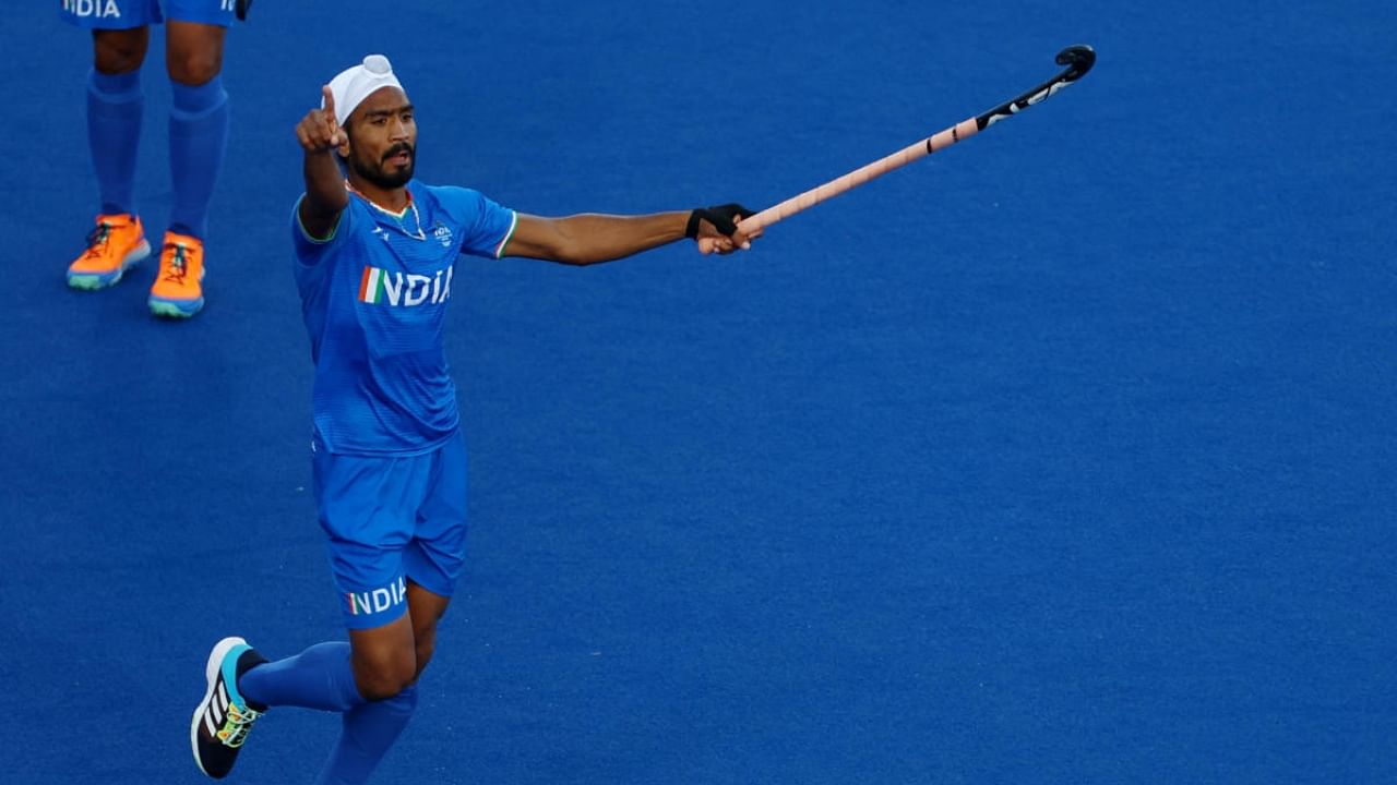 India's Singh Jugraj celebrates scoring their third goal. Credit: Reuters Photo