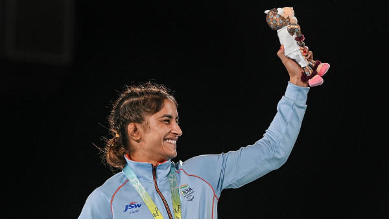 Gold medallist Vinesh Phogat during the Women's Freestyle Wrestling 53kg Nordic event medal ceremony at the Commonwealth Games (CWG), in Birmingham, UK, Saturday, Aug. 6, 2022. Credit: PTI Photo