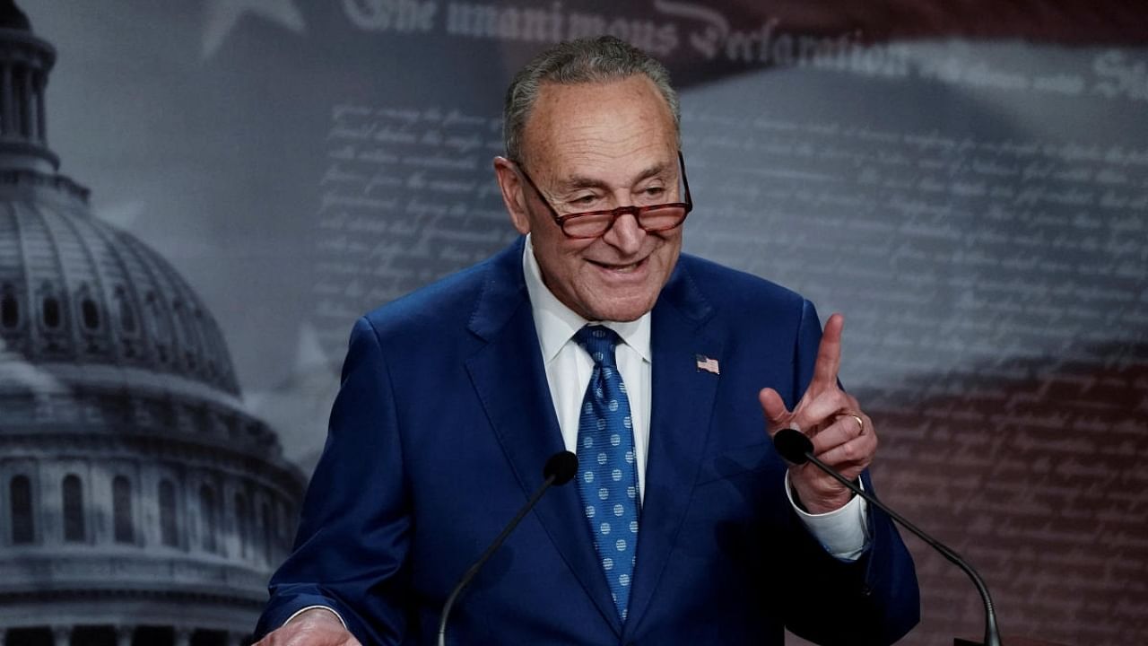 US Senate Majority Leader Chuck Schumer (D-NY) speaks to the media following the 51-50 vote passing of the "Inflation Reduction Act of 2022" on Capitol Hill in Washington, DC. Credit: Reuters Photo