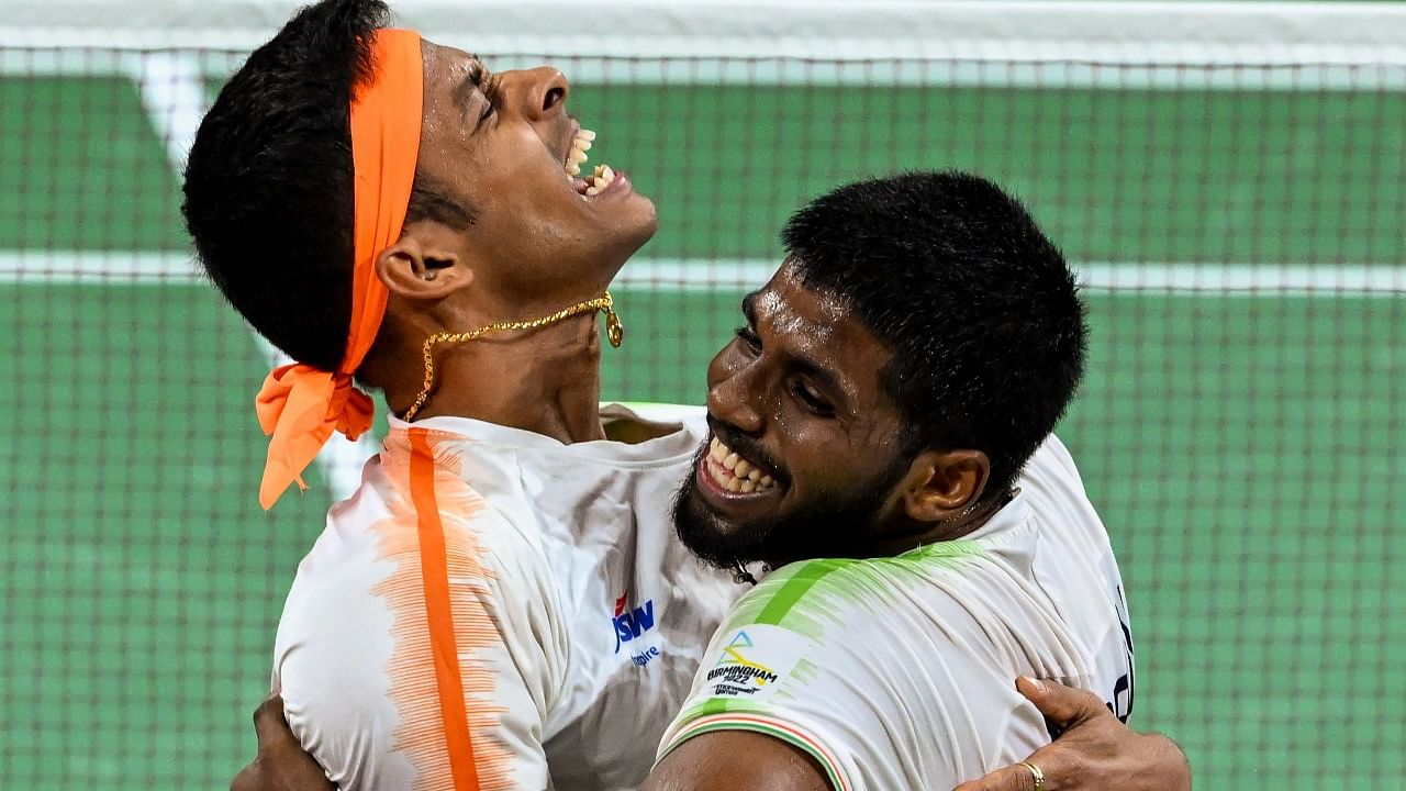 India's Satwiksairaj Rankireddy and Chirag Shetty celebrate after winning the Men's Doubles Final Badminton match against England's Ben Lane and Sean Vendy at the Commonwealth Games 2022 (CWG). Credit: PTI Photo