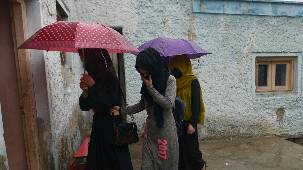Since seizing power a year ago, the Taliban have imposed harsh restrictions on girls and women to comply with their austere vision of Islam -- effectively squeezing them out of public life. Credit: AFP Photo